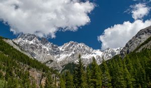 Preview wallpaper mountains, mountain range, peaks, trees, clouds