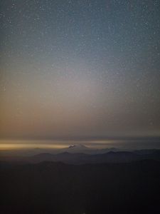 Preview wallpaper mountains, night, aerial view, fog, starry sky