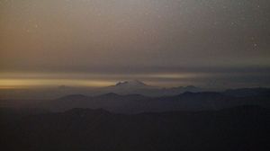 Preview wallpaper mountains, night, aerial view, fog, starry sky