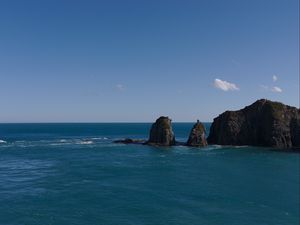 Preview wallpaper mountains, ocean, sea, clouds, horizon, nature