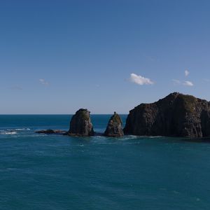 Preview wallpaper mountains, ocean, sea, clouds, horizon, nature
