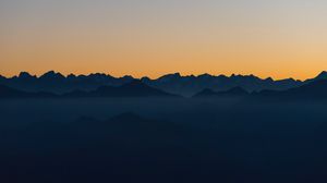 Preview wallpaper mountains, outlines, sunset, peaks, sky
