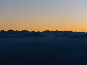 Preview wallpaper mountains, outlines, sunset, peaks, sky