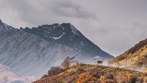 Preview wallpaper mountains, peak, car, off-road, nature