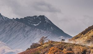 Preview wallpaper mountains, peak, car, off-road, nature