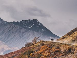 Preview wallpaper mountains, peak, car, off-road, nature