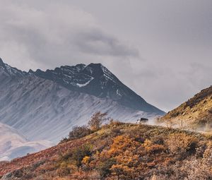 Preview wallpaper mountains, peak, car, off-road, nature