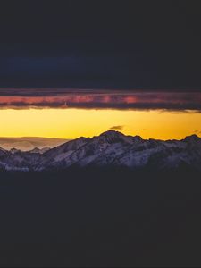 Preview wallpaper mountains, peak, clouds, night, sky, dark, snowy