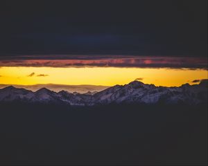 Preview wallpaper mountains, peak, clouds, night, sky, dark, snowy
