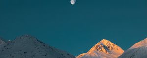 Preview wallpaper mountains, peak, moon, snowy, twilight