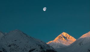 Preview wallpaper mountains, peak, moon, snowy, twilight