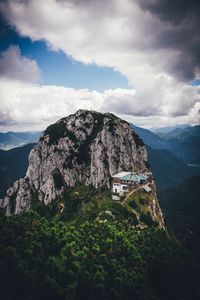 Preview wallpaper mountains, peak, mountain range, building, landscape, view