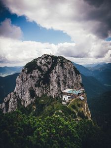 Preview wallpaper mountains, peak, mountain range, building, landscape, view