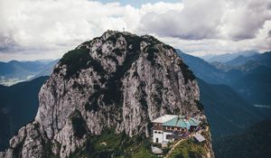 Preview wallpaper mountains, peak, mountain range, building, landscape, view