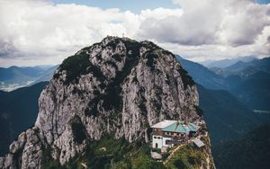 Preview wallpaper mountains, peak, mountain range, building, landscape, view