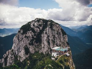 Preview wallpaper mountains, peak, mountain range, building, landscape, view