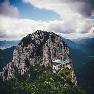 Preview wallpaper mountains, peak, mountain range, building, landscape, view