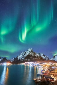 Preview wallpaper mountains, peak, northern lights, lake, lights