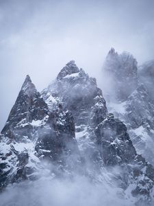 Preview wallpaper mountains, peak, rocks, snow, clouds