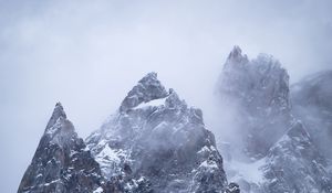 Preview wallpaper mountains, peak, rocks, snow, clouds