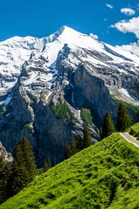 Preview wallpaper mountains, peak, slope, rocks, snow, snowy