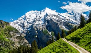 Preview wallpaper mountains, peak, slope, rocks, snow, snowy