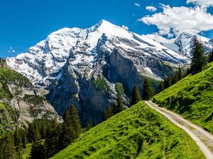 Preview wallpaper mountains, peak, slope, rocks, snow, snowy