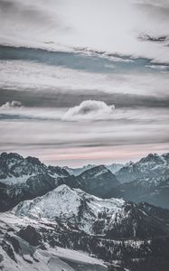 Preview wallpaper mountains, peak, snow, snowy, winter, sunset, sky, clouds