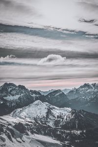 Preview wallpaper mountains, peak, snow, snowy, winter, sunset, sky, clouds