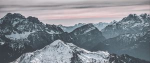 Preview wallpaper mountains, peak, snow, snowy, winter, sunset, sky, clouds