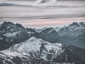 Preview wallpaper mountains, peak, snow, snowy, winter, sunset, sky, clouds