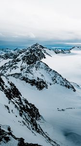 Preview wallpaper mountains, peak, snowy, snow, rocks
