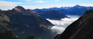 Preview wallpaper mountains, peaks, aerial view, fog, clouds, alps
