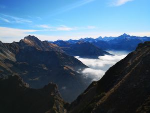 Preview wallpaper mountains, peaks, aerial view, fog, clouds, alps