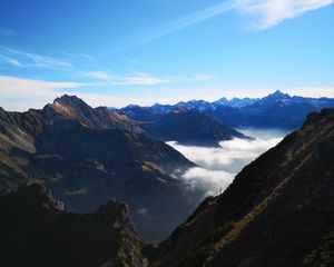 Preview wallpaper mountains, peaks, aerial view, fog, clouds, alps