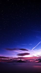 Preview wallpaper mountains, peaks, clouds, starry sky, aerial view, night