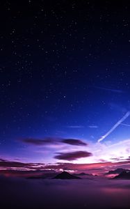 Preview wallpaper mountains, peaks, clouds, starry sky, aerial view, night