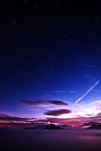 Preview wallpaper mountains, peaks, clouds, starry sky, aerial view, night