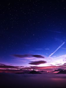 Preview wallpaper mountains, peaks, clouds, starry sky, aerial view, night