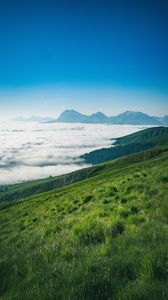 Preview wallpaper mountains, peaks, clouds, slope, grass