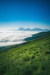 Preview wallpaper mountains, peaks, clouds, slope, grass