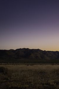 Preview wallpaper mountains, peaks, grass, twilight, sky