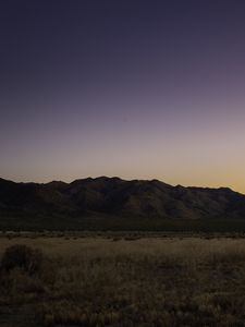 Preview wallpaper mountains, peaks, grass, twilight, sky