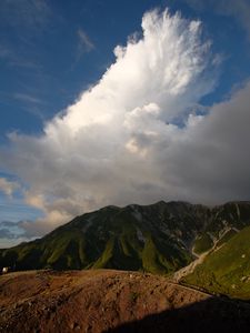 Preview wallpaper mountains, peaks, relief, grass, clouds