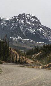 Preview wallpaper mountains, peaks, road, forest, snowy