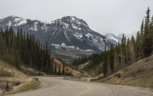 Preview wallpaper mountains, peaks, road, forest, snowy