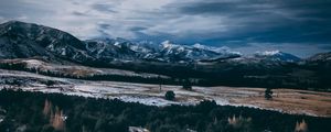 Preview wallpaper mountains, peaks, road, forest, snow, snowy