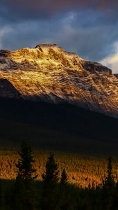 Preview wallpaper mountains, peaks, rock, rays, forest