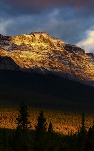 Preview wallpaper mountains, peaks, rock, rays, forest