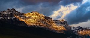 Preview wallpaper mountains, peaks, rock, rays, forest